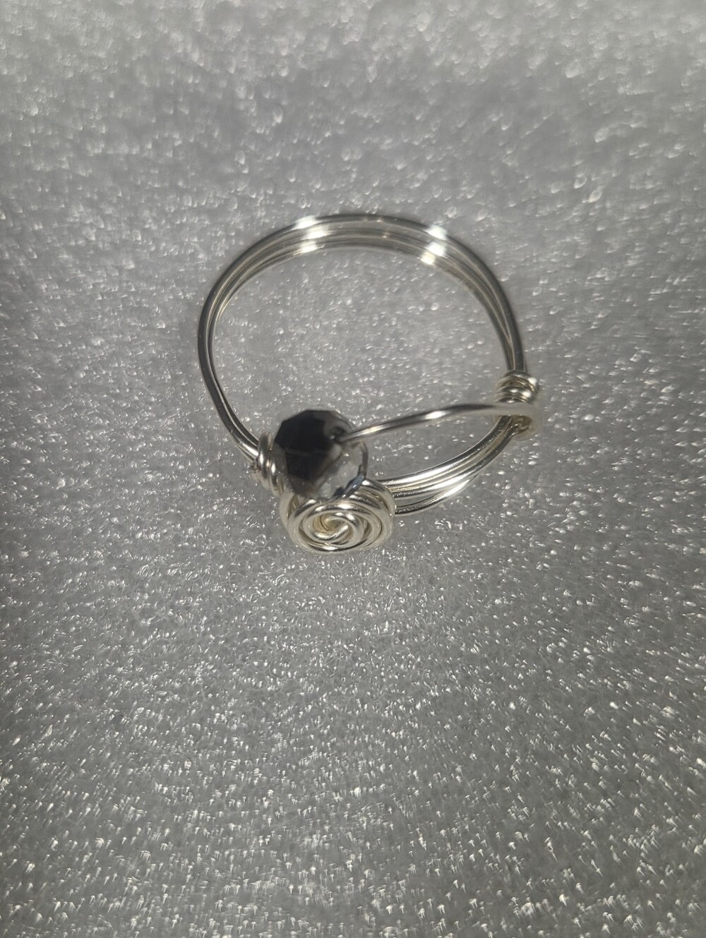 Handcrafted Silver Wire Rose Fidget Ring with Black/Blue Faceted Bead